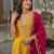 Women’s mustard yellow embroidered long flared kurta pant set with contrast pink border work dupatta