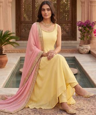 Women yellow anarkali kurta with yellow pant and pink dupatta 3
