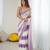 Lilac tissue satin embellished saree with unstitched blouse piece.