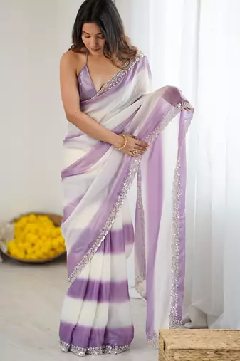 Lilac tissue satin embellished saree with unstitched blouse piece.