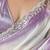 Lilac tissue satin embellished saree with unstitched blouse piece.
