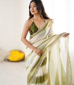 Olive tissue satin embellished saree with unstitched blouse piece.