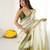 Olive tissue satin embellished saree with unstitched blouse piece.