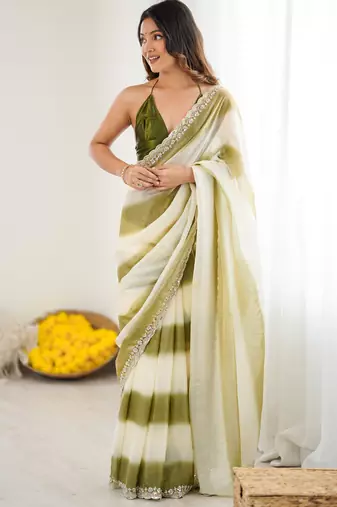 Olive tissue satin embellished saree with unstitched blouse piece.