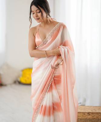 Peach tissue satin embellished saree with unstitched blouse piece. 1