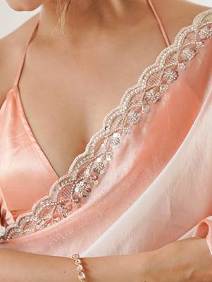 Peach tissue satin embellished saree with unstitched blouse piece. 4