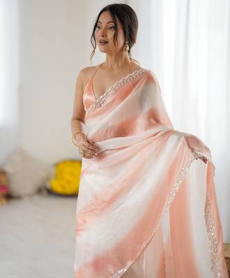 Peach tissue satin embellished saree with unstitched blouse piece. 5