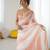 Peach tissue satin embellished saree with unstitched blouse piece.