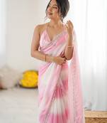 Pink tissue satin embellished saree with unstitched blouse piece.