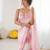 Pink tissue satin embellished saree with unstitched blouse piece.