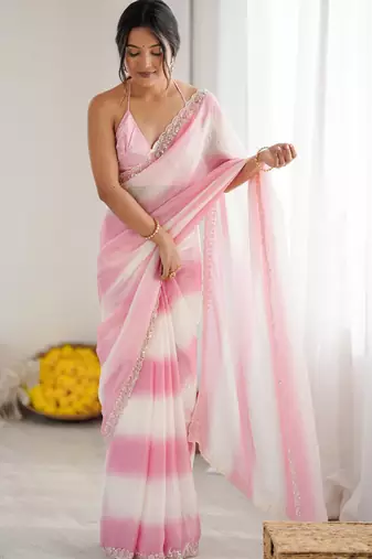 Pink tissue satin embellished saree with unstitched blouse piece.