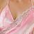 Pink tissue satin embellished saree with unstitched blouse piece.