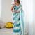 Sky blue tissue satin embellished saree with unstitched blouse piece.