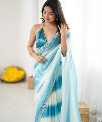Sky blue tissue satin embellished saree with unstitched blouse piece. 2