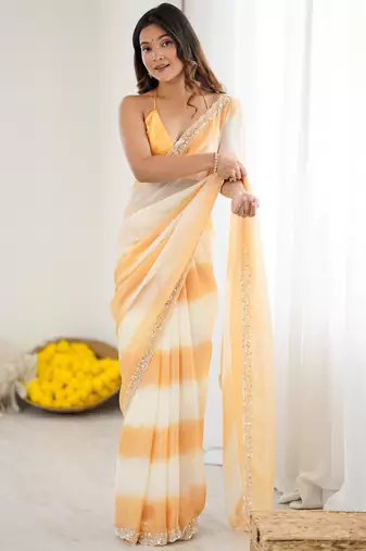 Yellow tissue satin embellished saree with unstitched blouse piece.