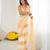 Yellow tissue satin embellished saree with unstitched blouse piece.