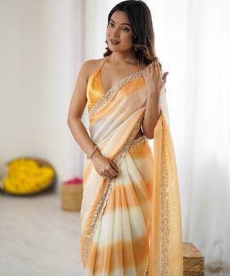 Yellow tissue satin embellished saree with unstitched blouse piece. 2