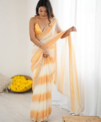 Yellow tissue satin embellished saree with unstitched blouse piece. 3