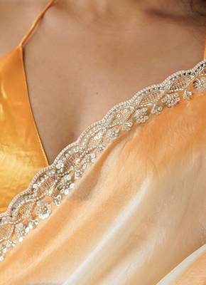 Yellow tissue satin embellished saree with unstitched blouse piece. 4