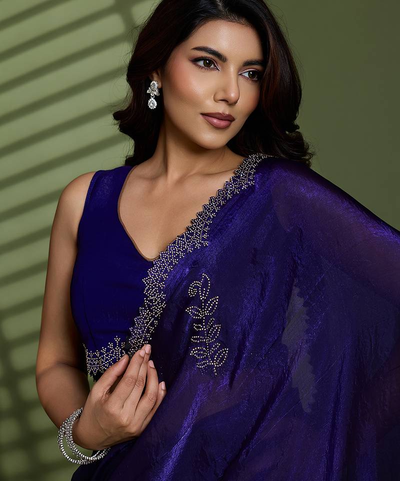 Purple tissue satin embellished saree with unstitched blouse piece.
