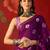 Purple silk cotton bandhni printed saree with unstitched blouse piece.