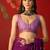 Purple silk cotton bandhni printed saree with unstitched blouse piece.