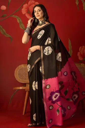 Black silk cotton bandhni printed saree with unstitched blouse piece.