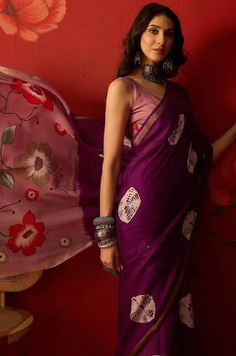 Purple silk cotton bandhni printed saree with unstitched blouse piece.