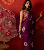 Purple silk cotton bandhni printed saree with unstitched blouse piece.
