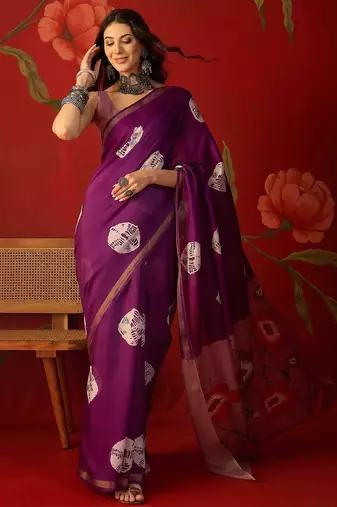 Purple silk cotton bandhni printed saree with unstitched blouse piece.