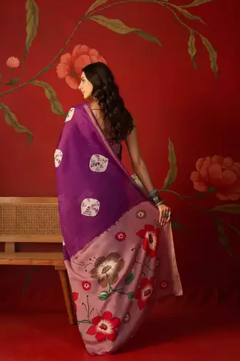 Purple silk cotton bandhni printed saree with unstitched blouse piece.