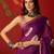 Purple silk cotton bandhni printed saree with unstitched blouse piece.
