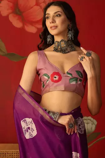 Purple silk cotton bandhni printed saree with unstitched blouse piece.