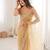 Chiku net embellished saree with unstitched blouse piece.