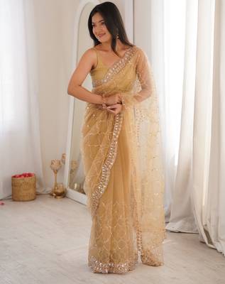 Chiku net embellished saree with unstitched blouse piece. 2