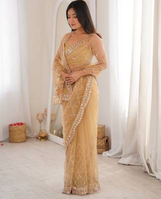 Chiku net embellished saree with unstitched blouse piece. 3