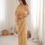 Chiku net embellished saree with unstitched blouse piece.