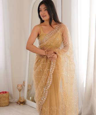Chiku net embellished saree with unstitched blouse piece. 4