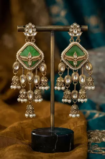 Green color kundan earrings beautiful festive designer appeal
