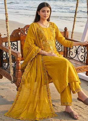 mustard yellow floral embroidered cotton straight kurta set with dupatta. 2