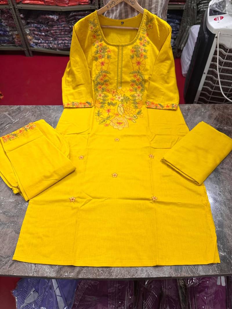 mustard yellow floral embroidered cotton straight kurta set with dupatta.