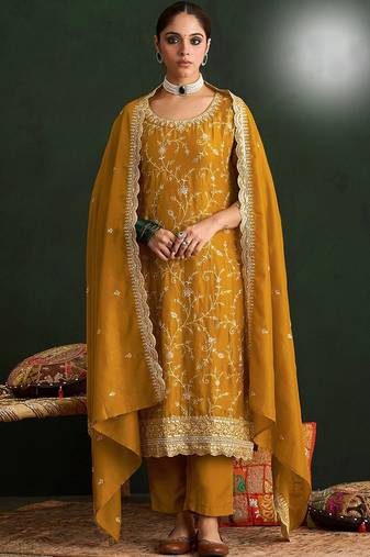 Mustard color smart ethnic ceremonial vichitra silk embroidered suit