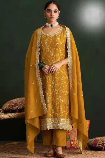 Mustard color smart ethnic ceremonial vichitra silk embroidered suit