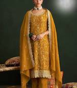 Mustard color smart ethnic ceremonial vichitra silk embroidered suit
