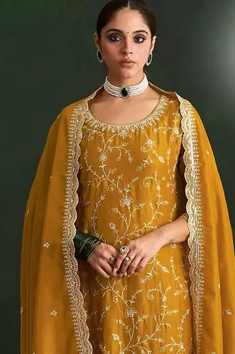 Mustard color smart ethnic ceremonial vichitra silk embroidered suit