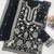 Black color smart and graceful sharara dress for trendy girls