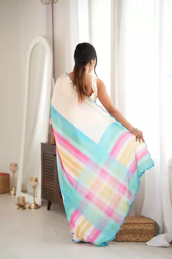 off white color tissue fabric digital printed fancy mirror work saree