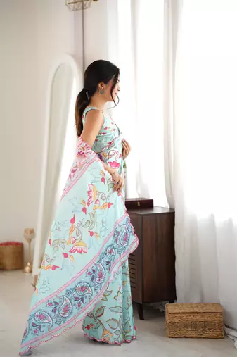 sea green color tissue fabric smart printed saree with beautiful border work