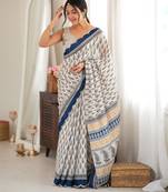 blue color tissue fabric smart printed saree with beautiful border work