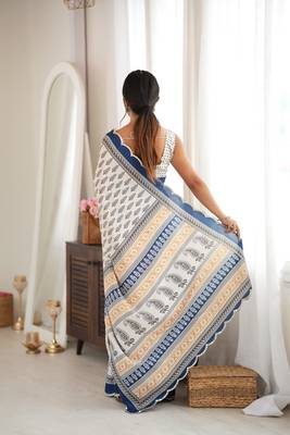 blue color tissue fabric smart printed saree with beautiful border work 2